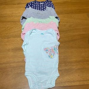 Carter’s long-sleeve onesies NB